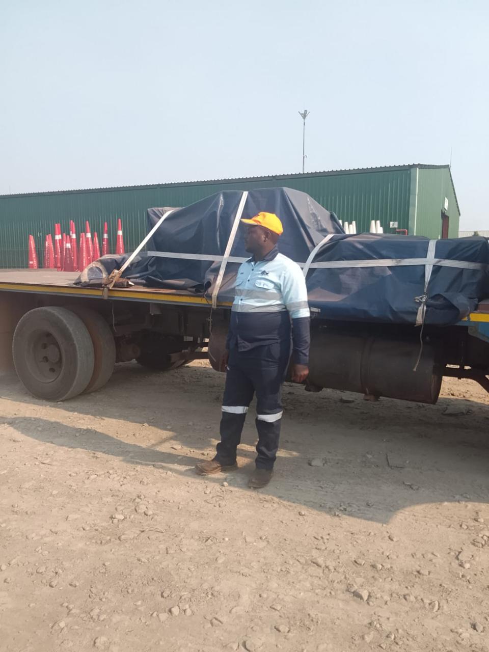 Mcutter curtain-side trailer loaded with palletised cargo